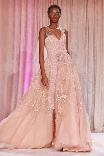 Nardos designed textured embroidered full gown with a graceful tulle skirt, evoking a dreamy, ethereal elegance.